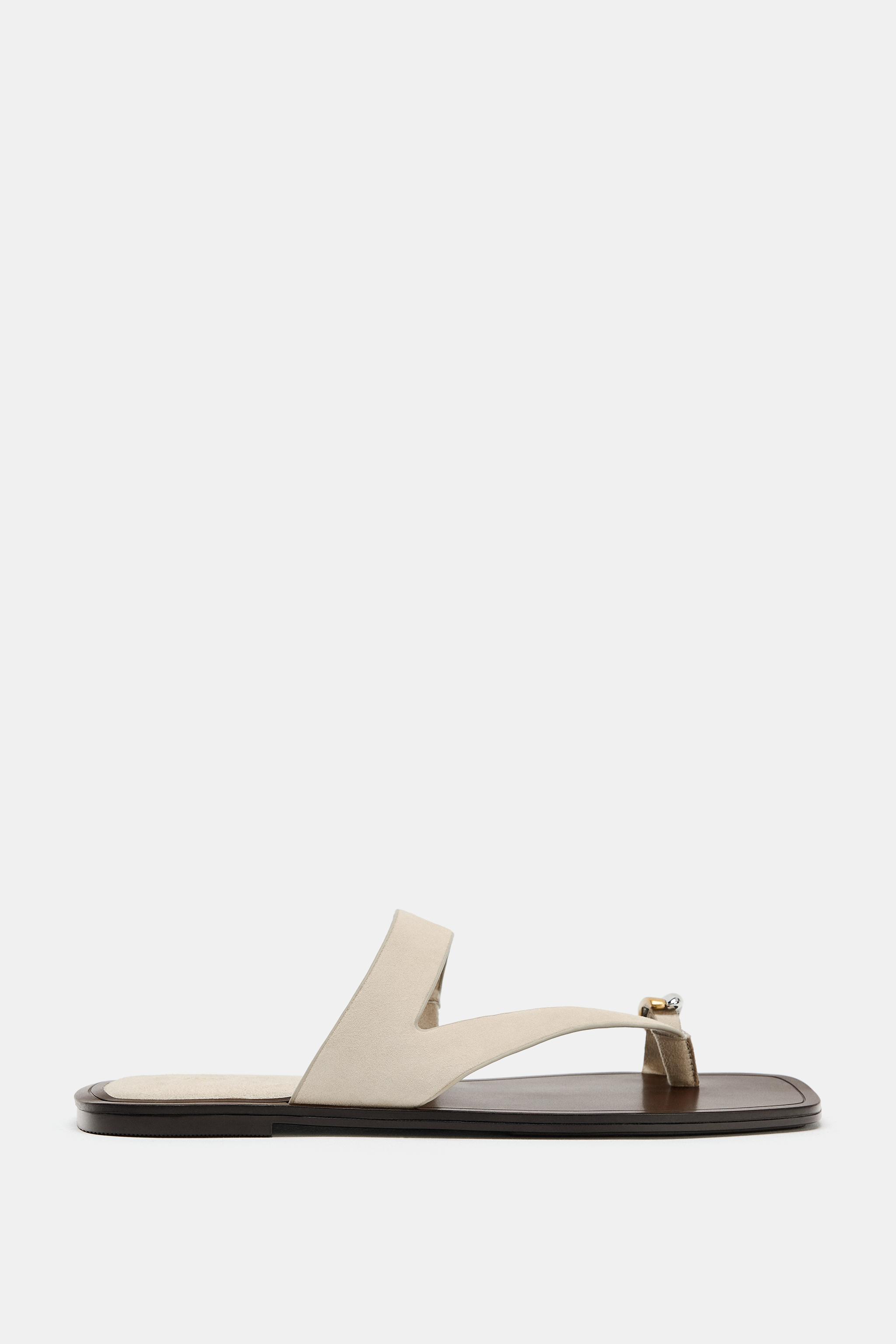 LEATHER SANDALS WITH METAL DETAIL